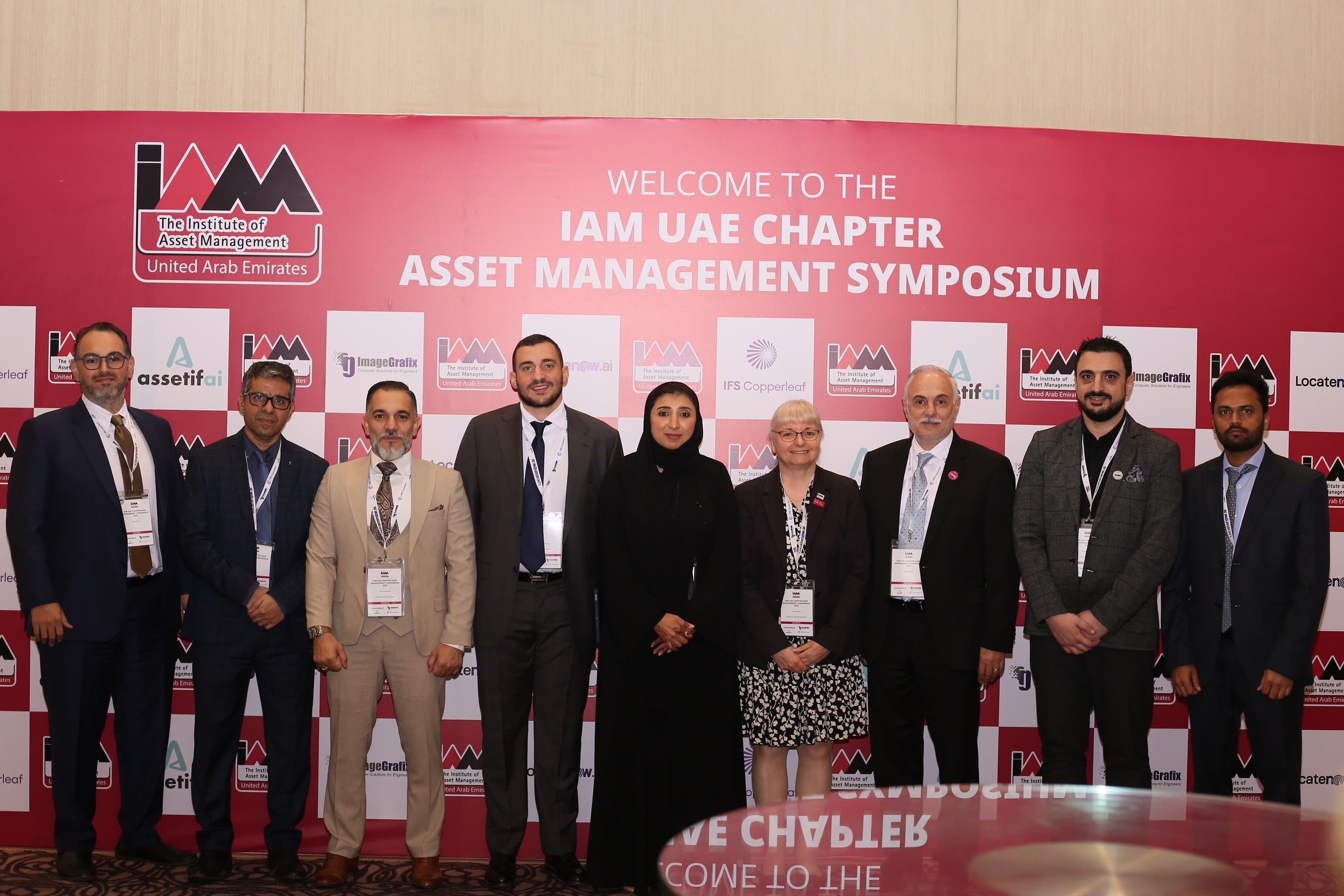 Group image of men and women against a background announcing the 