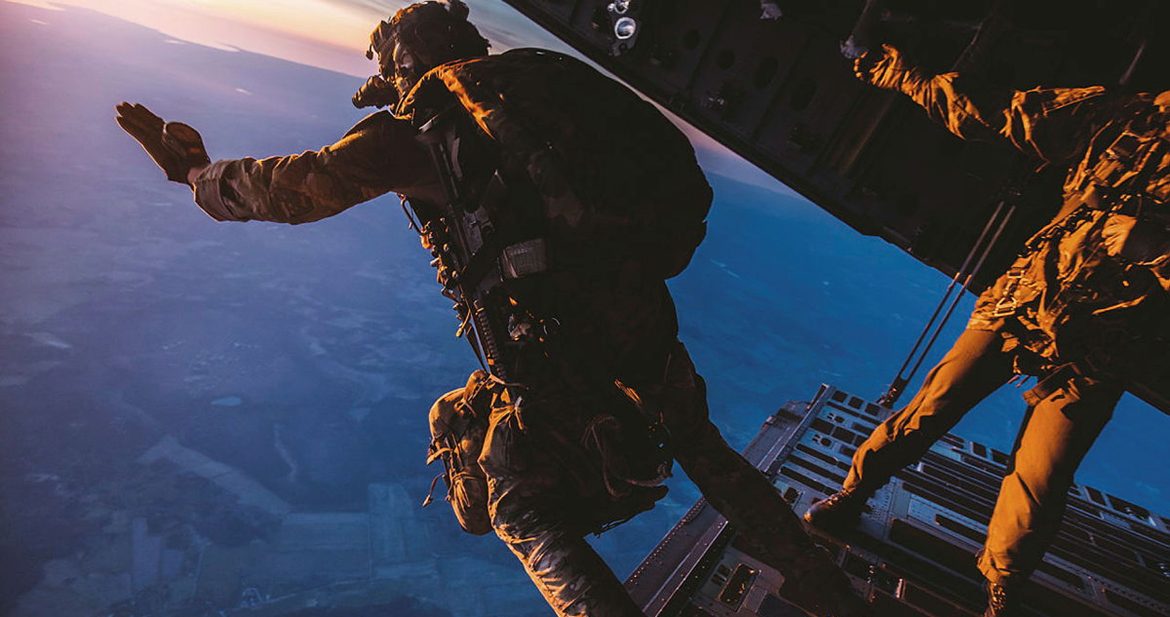 A Hercules plane on a runway at night