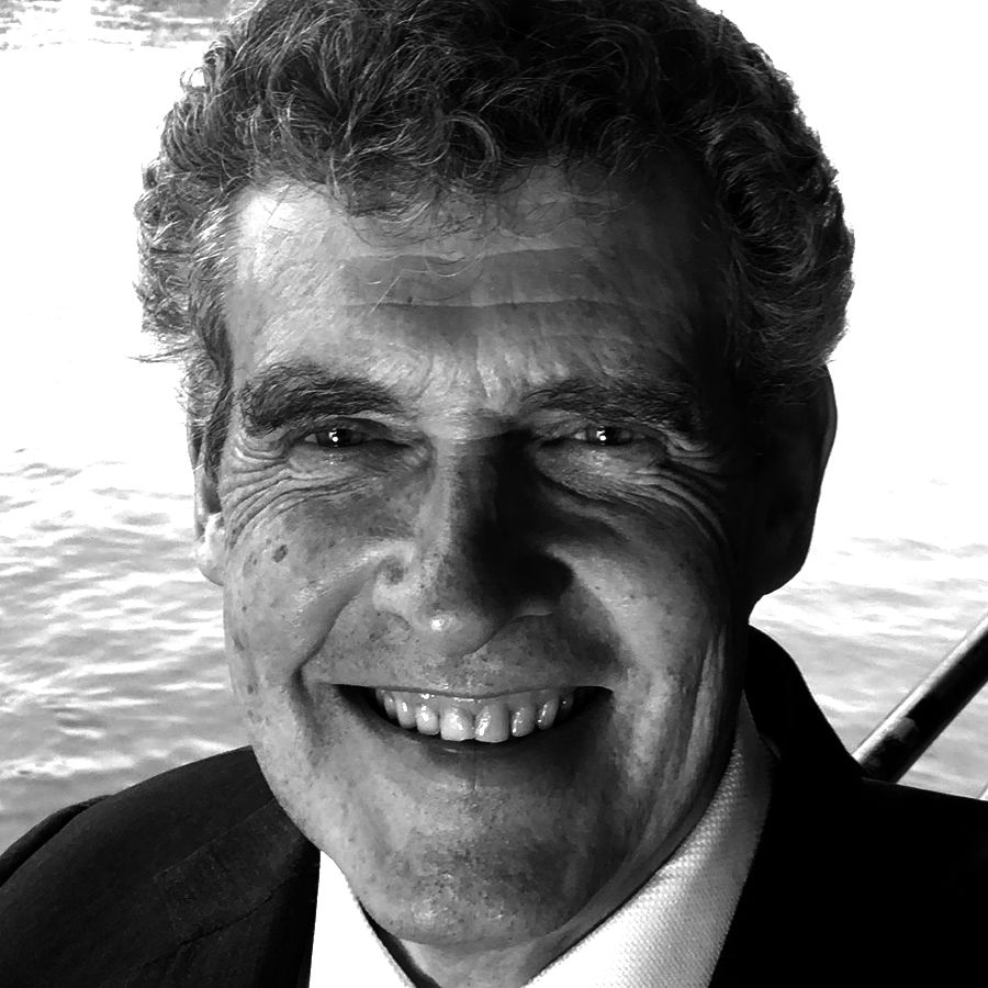 Headshot of a man smiling into the camera