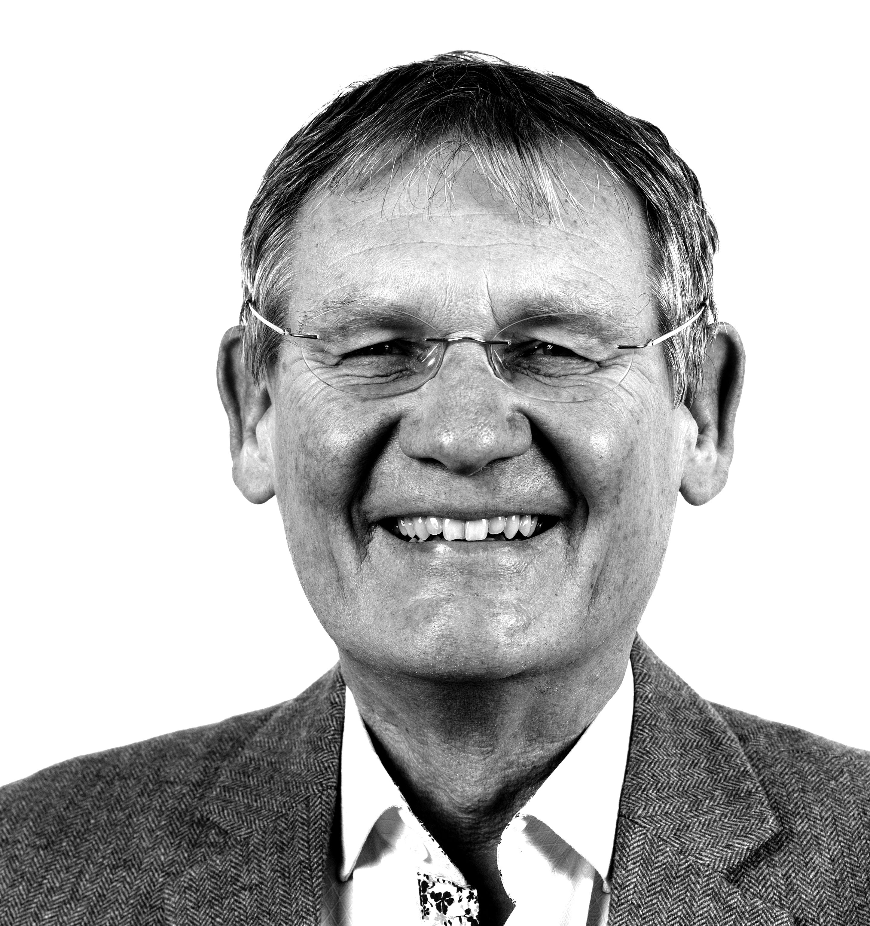 Headshot of a man smiling into the camera