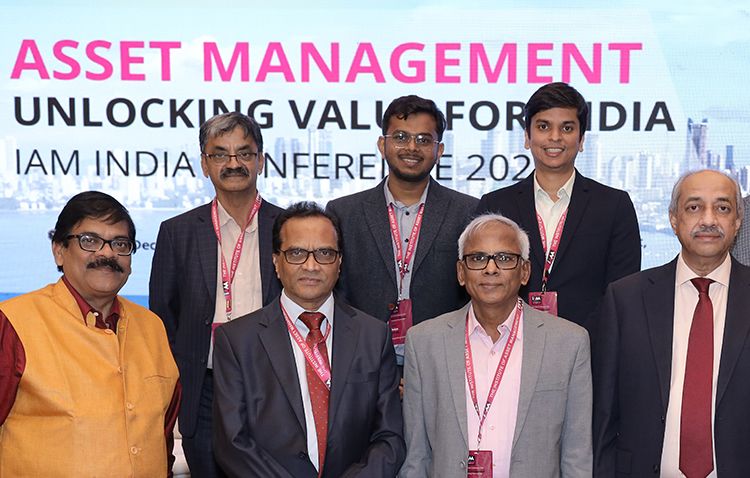 People smiling into camera at the IAM India chapter conference 2025