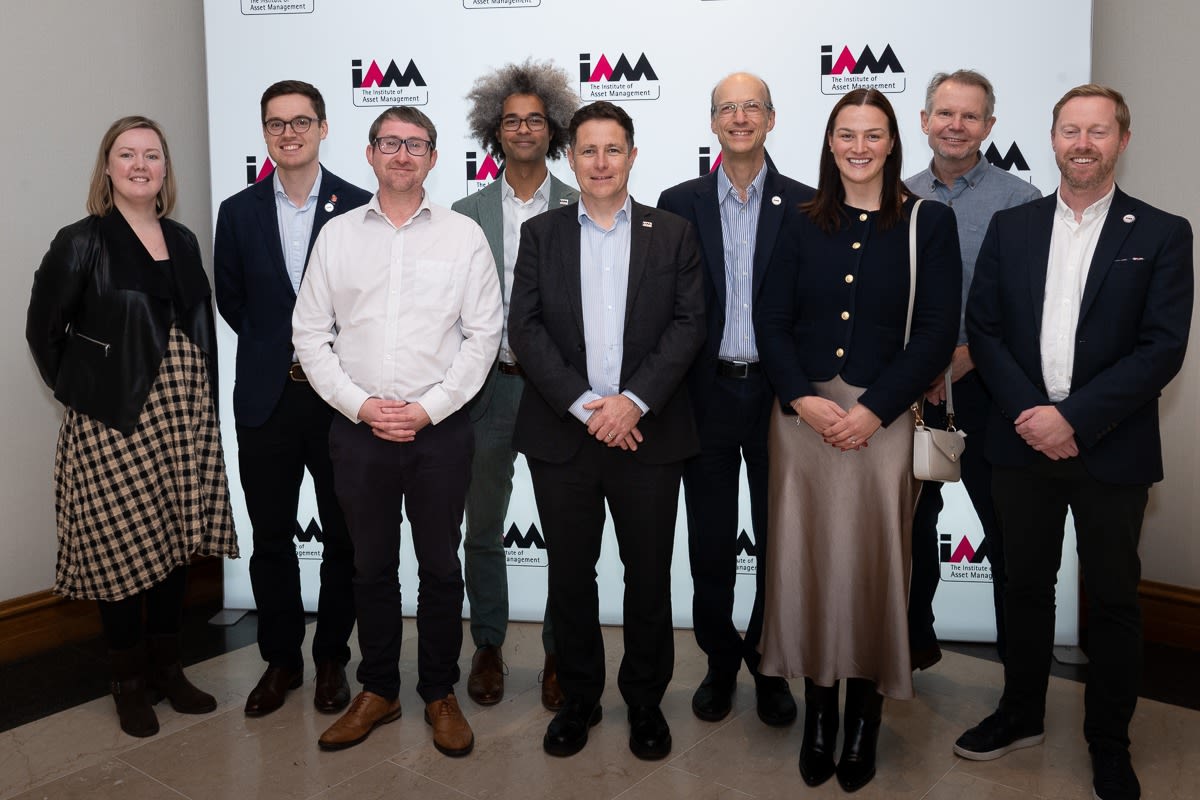 Group of people smiling into camera