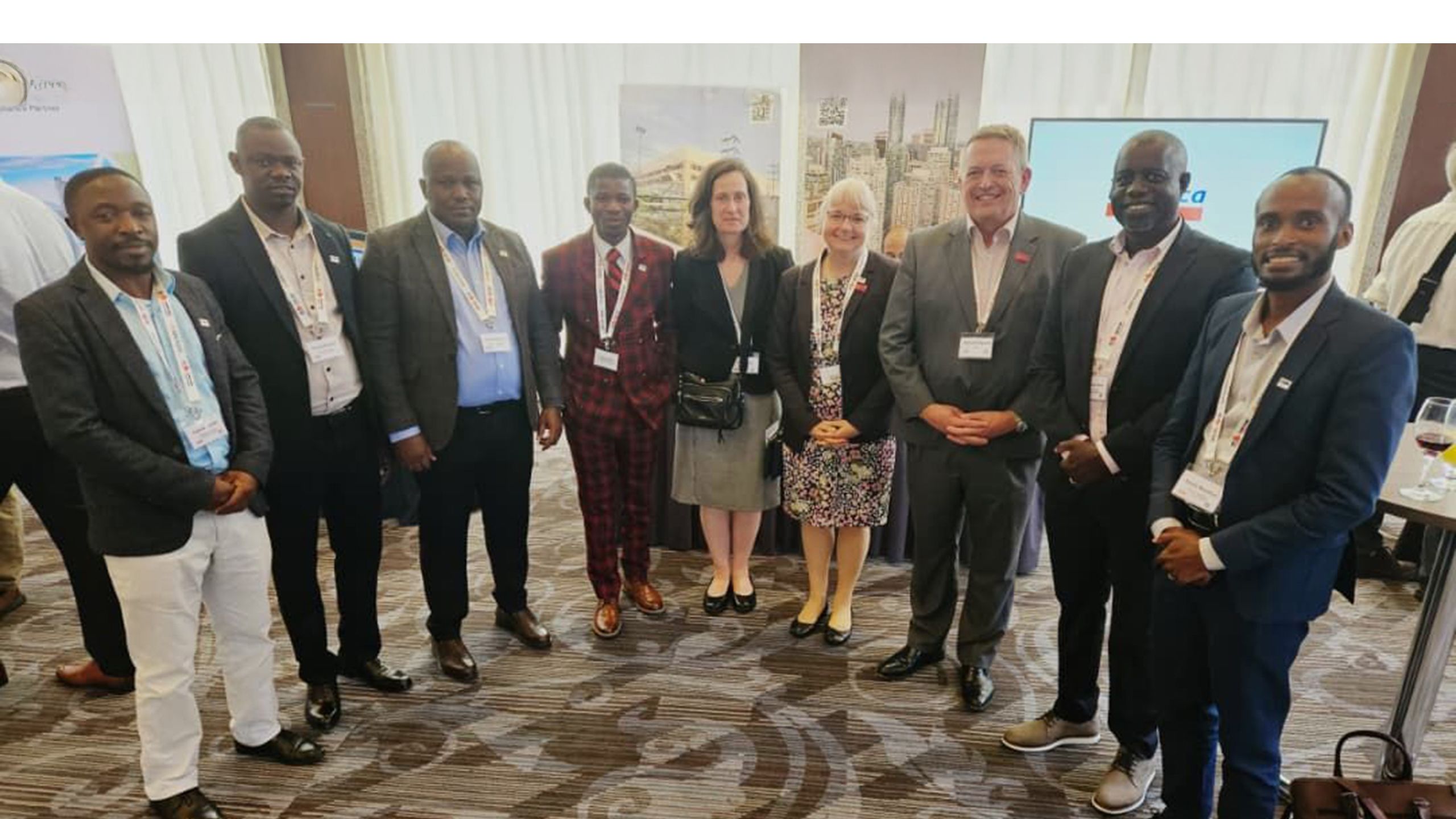 Group of people smiling into camera